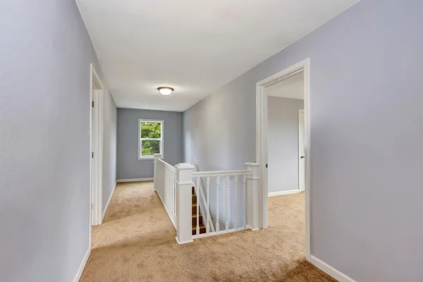 Upstairs empty hallway interior in lavender color.