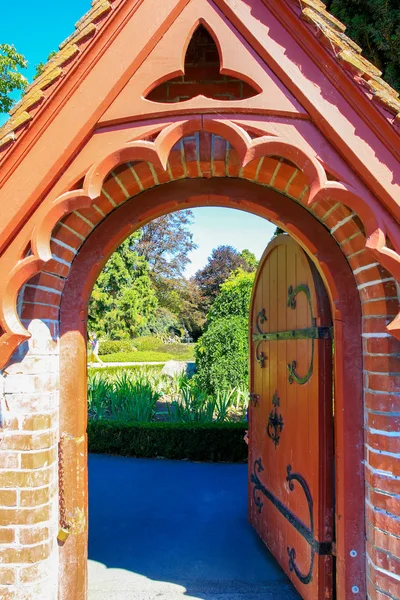 Carved wooden garden gate in Christchurch Botanic Garden