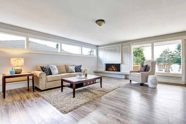 Spacious living room interior with polished hardwood