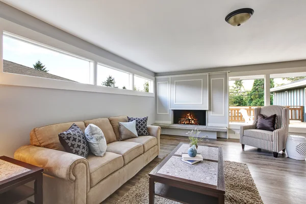 Spacious living room interior with polished hardwood