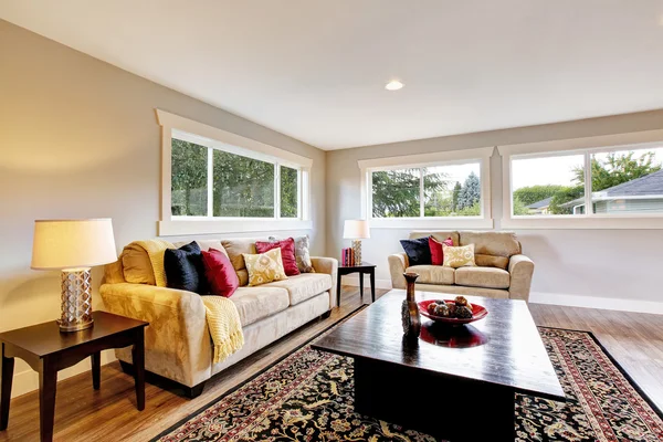 Spacious living room interior with polished hardwood