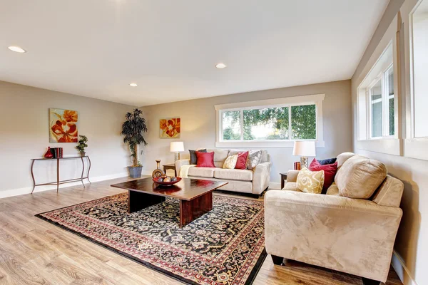 Spacious living room interior with polished hardwood