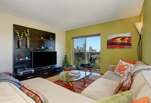 Modern living room interior with light green walls