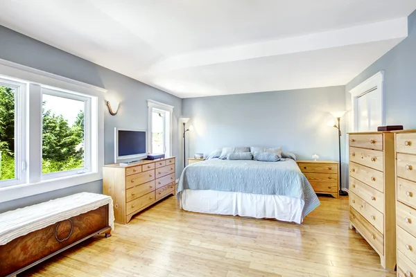 Bright light blue bedroom interior