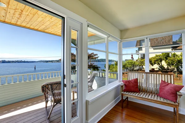 Sun room and walkout deck. American architecture. Real estate wi