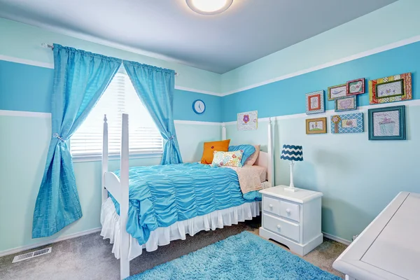 Charming girls room interior in blue tones