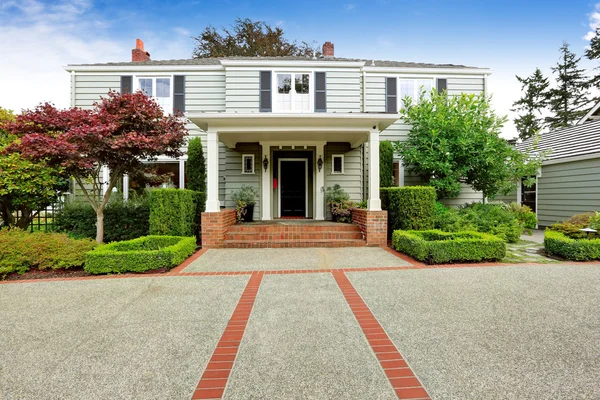 Luxury real estate in Tacoma, WA. Entrance porch with brick trim
