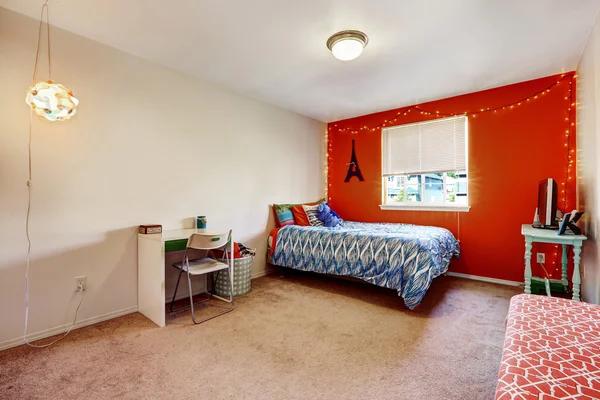 Bedroom with bright red wall