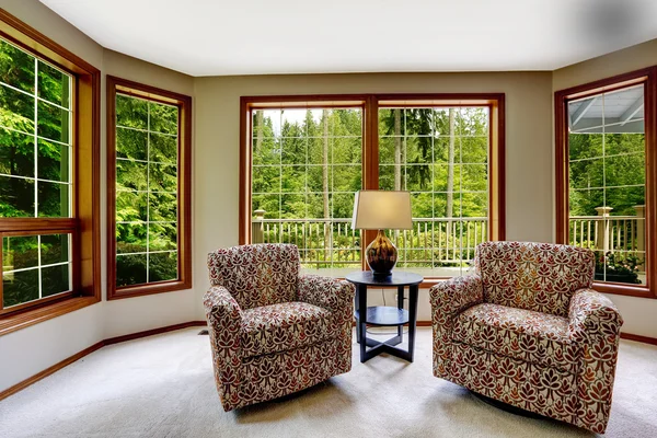 Comfort sitting area with large french windows