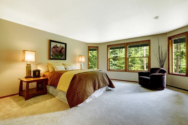 Spacious master bedroom with comfortable bed
