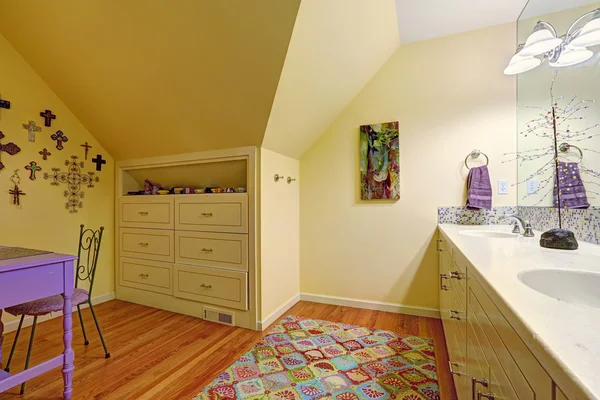 Kids bathroom interior with storage cabinet and table