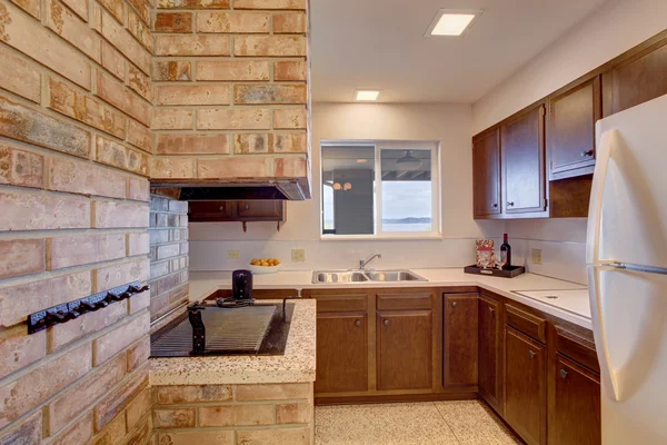 Basement kitchen room with chimney