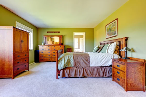Master bedroom interior in bright green color