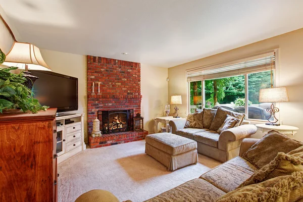 Cozy living room with brick fireplace