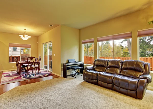 Cozy living room with carpet, and fireplace.