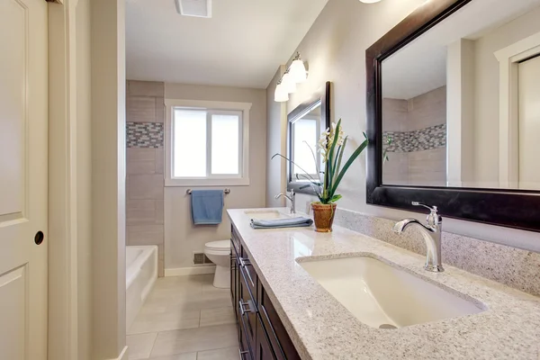 Beautiful bathroom with tile floor.