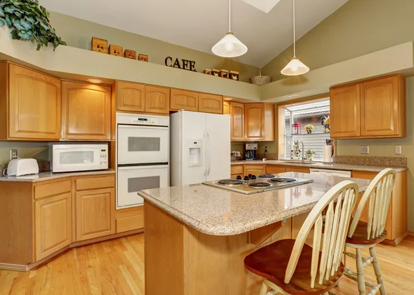 Traditional kitchen with dinning area.