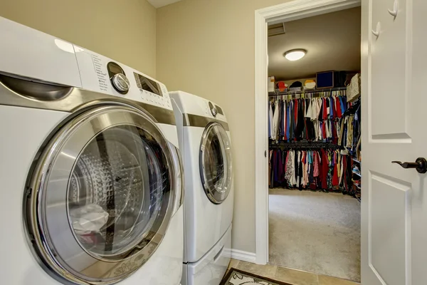 Excellent laundry room with washer and dryer.