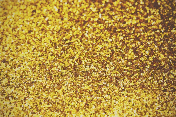 Close up a fine shining gold glitter