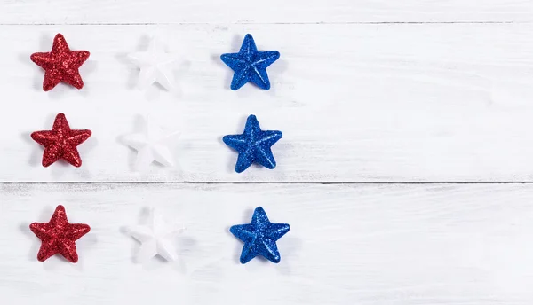 USA holiday stars on white wooden boards