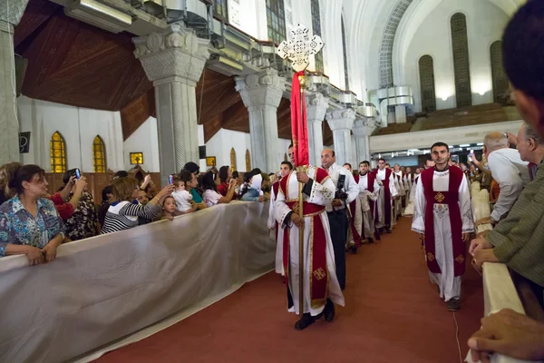 Clergymen accompany the Pope of the Coptic Orthodox Church of Al