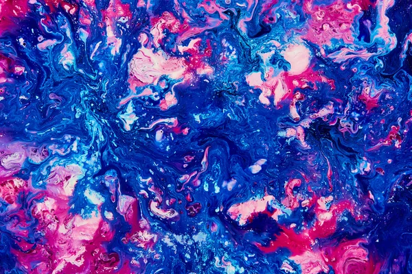 Abstract blue and pink paint background