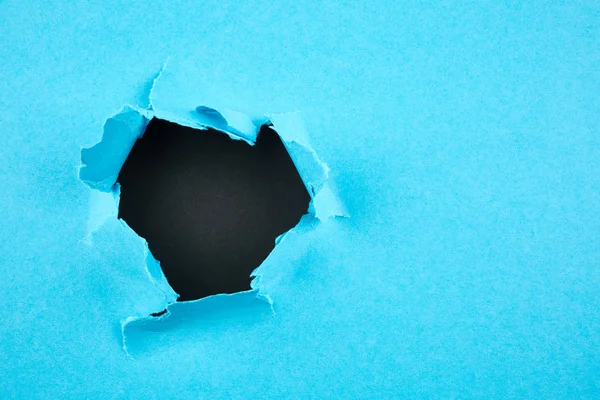 Hole in paper background