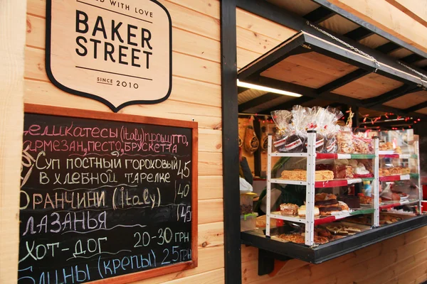 KIEV, UKRAINE, 20 DECEMBER, 2015. Christmas market on Sophia Square in Kyiv, Ukraine. Trade rows of sweets and gourmet food