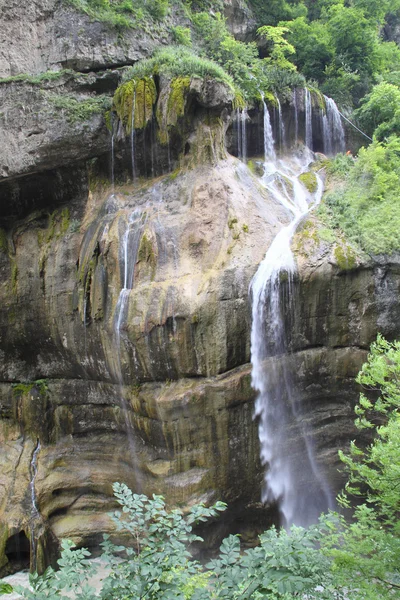 Beautiful waterfall falling off a cliff, Chegem Gorge,  Caucasus