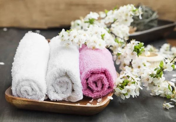 Spa Setting with Cotton Towels and Flowers
