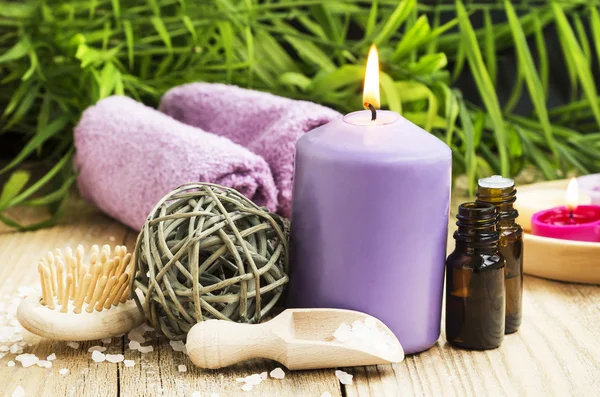 Spa. Essential Oil with Scent Candle on Wellness Background