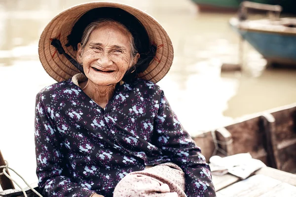 An unidentified Vietnamese woman smile