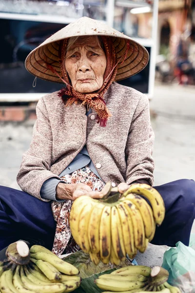Vietnamese street vendor in Hue