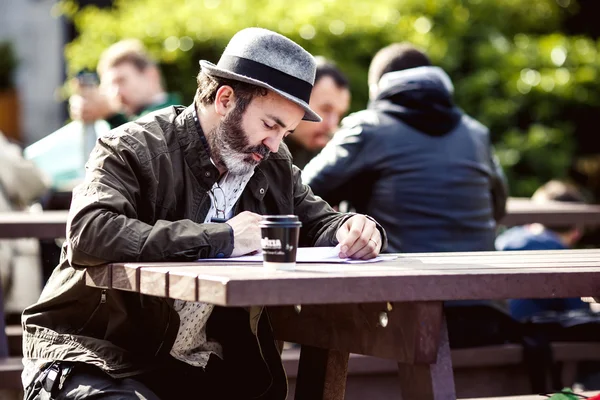 Man in street restaurant in Dublin