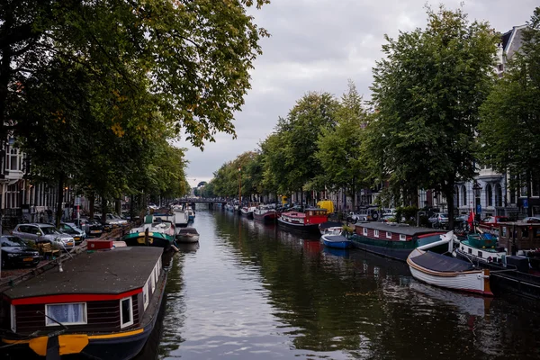 Romantic canal, boat in Amsterdam