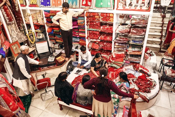 People in local textile shop in Jaipur