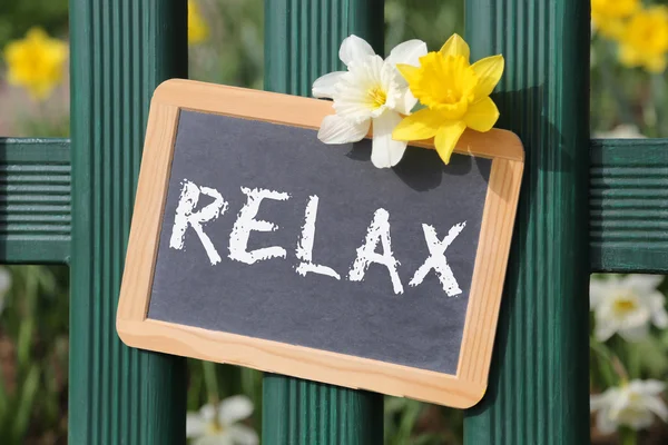 Relax relaxing garden with flowers flower spring sign board