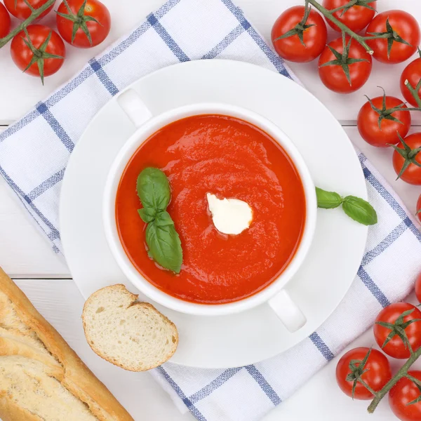 Tomato soup meal with tomatoes in cup from above healthy eating