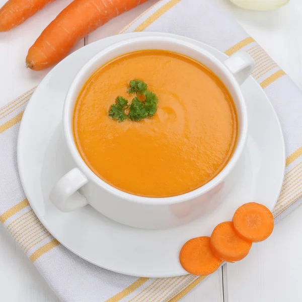 Healthy eating carrot soup lunch with carrots in bowl