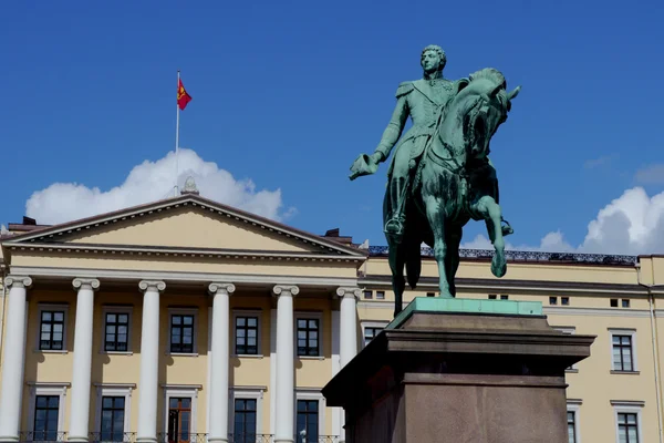 Norwegian royal palace with statue