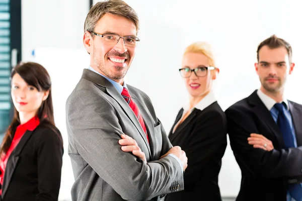 Business - group of businesspeople in office