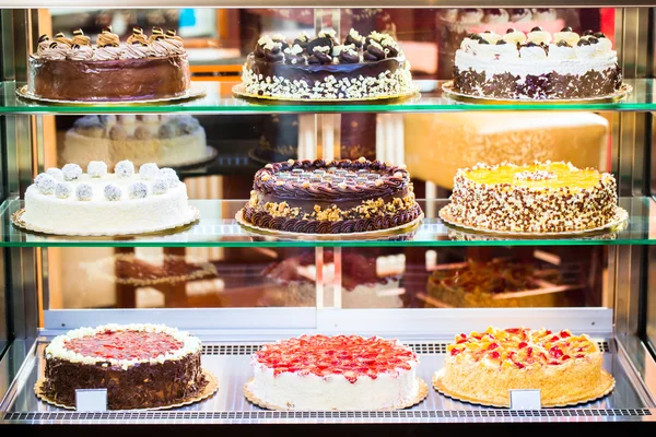 Pastry shop in glass cabinet display