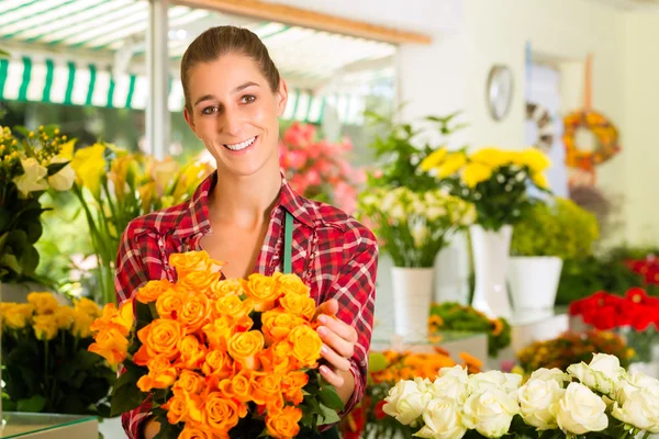 Female florist in flower shop