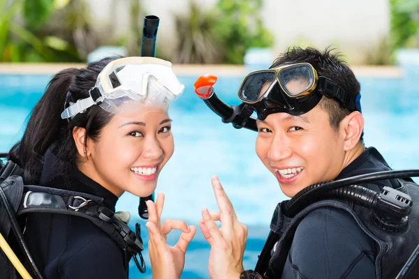 Teacher and student in a diving school