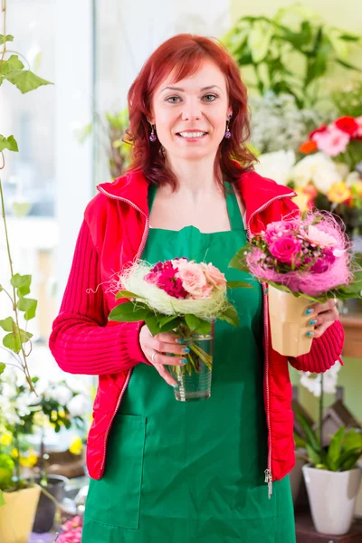 Florist working in flower shop