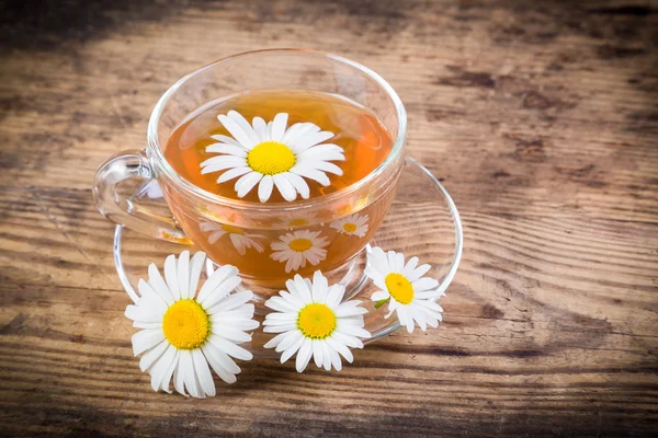 Herbal tea with chamomile flowers