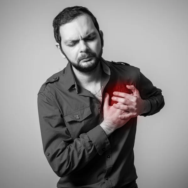 Bearded man having heart pain