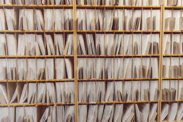 Keeping paper records on the shelves.
