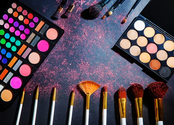 Makeup palette with makeup brush. Makeup background