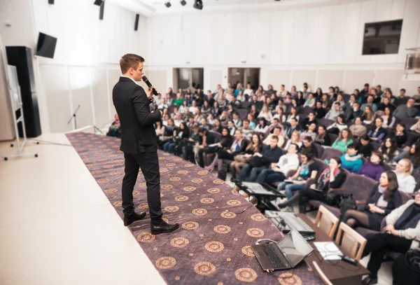 Speaker at Business Conference and Presentation. Audience at the conference hall.